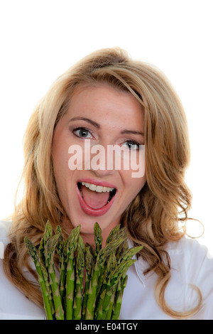 Frau mit grünem Spargel, Frau Mit Gruenem Spargel Stockfoto