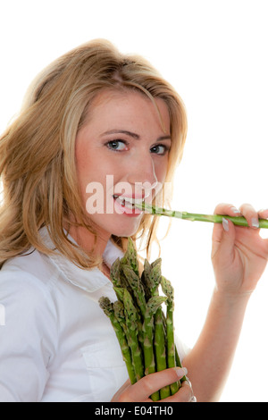 Frau mit grünem Spargel, Frau Mit Gruenem Spargel Stockfoto