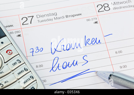 Ein Termin in einem Kalender eingetragen: Krankenhaus, Ein Termin ist in Einem Kalender Eingetragen: Krankenhaus Stockfoto