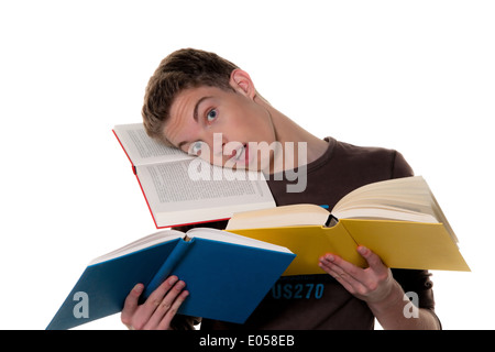 Ein junger Student mit lernen mit Büchern, Ein Junger Schüler Beim Lernen Mit Buechern Stockfoto