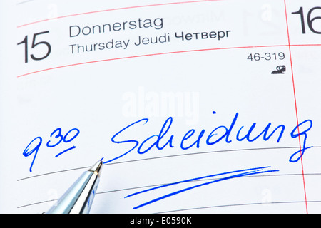 Ein Termin in einem Kalender eingetragen: Trennung, Ein Termin ist in Einem Kalender Eingetragen: Scheidung Stockfoto