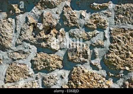 Mauerwerk - alte Stein Wand-Struktur von einzelnen Einheiten gelegt und durch Mörtel verbunden. Stockfoto