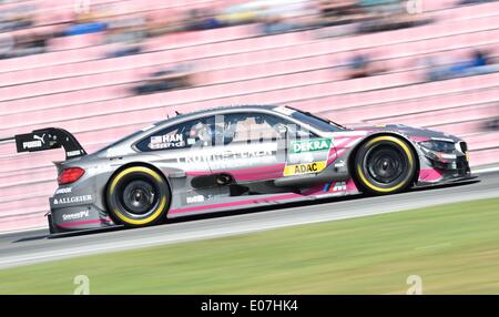 Hockenheim, Deutschland. 4. Mai 2014. US-DTM-Rennfahrer Joey Hand BMW Team RBM Rennen seine BMW M4 im ersten Rennen der Deutschen Tourenwagen Masters Saison auf Rennstrecke Hockenheimring in Hockenheim, Deutschland, 4. Mai 2014. Foto: Uwe Anspach/Dpa/Alamy Live News Stockfoto