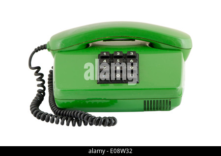 Altes grünes Haus-Telefon mit schwarzen Knöpfen isoliert auf weißem Hintergrund Stockfoto