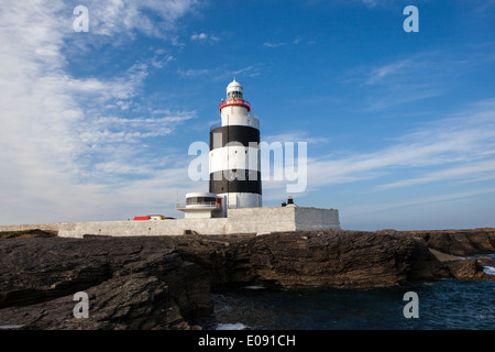 Die Hook Lighthouse Fethard am Meer, Wexford, Irland ist eines der ältesten Leuchttürme der Welt. Stockfoto