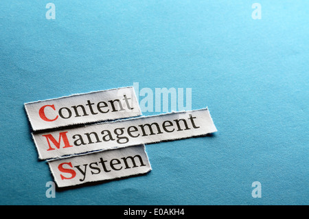 CMS Content Management System Abkürzung auf blauem Papier Stockfoto