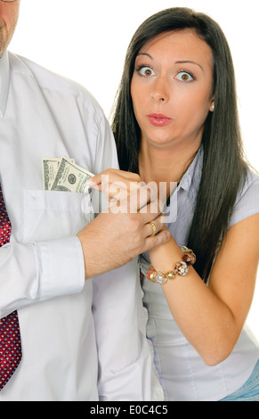 Junge Frau mit einem Mann zieht Geld aus der Tasche. Dollar Zieht Junge Frau Einem Mann Geld aus der Tasche. Dollar Stockfoto