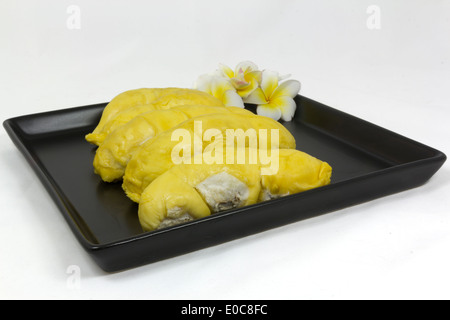 Durian auf schwarzen Keramik-Platte Stockfoto