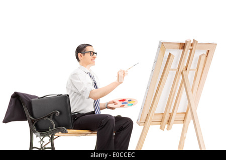 Männliche Geschäftsmann auf einer Leinwand malen Stockfoto