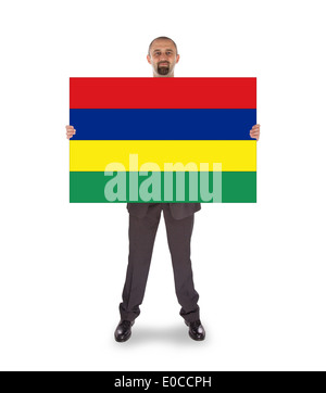 Lächelnd Geschäftsmann eine große Karte Flagge von Mauritius Stockfoto