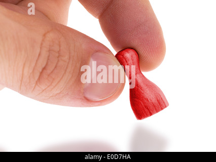 Hölzerne Bauer mit einer Volltonfarbe Malerei rot Stockfoto