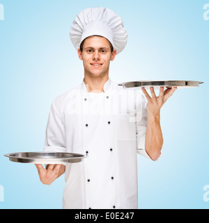 Restaurant Koch textfreiraum für Menü mit Preisen auf einem Tablett serviert. Stockfoto