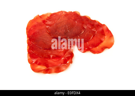 Bresaola Della Valtellina P.G.I-italienische Luft getrocknete Rindfleisch-Scheiben. Stockfoto