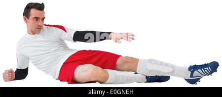 Fußballspieler in weißen treten Stockfoto