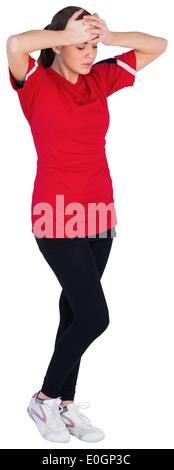 Enttäuscht Fußball-Fan in rot Stockfoto