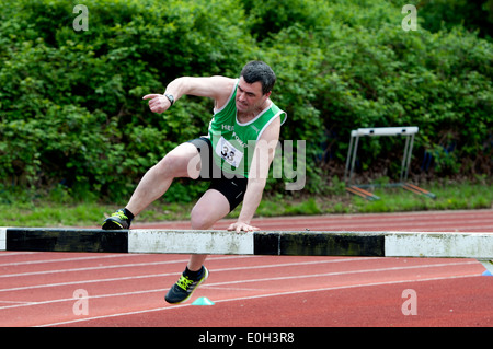 Leichtathletik, Männer Hindernislauf auf Vereinsebene, UK Stockfoto