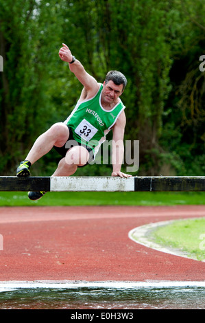 Leichtathletik, Männer Hindernislauf auf Vereinsebene, UK Stockfoto
