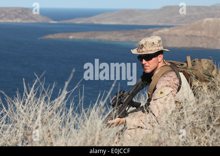 CPL. Joshua C. Riggs, 23, ein Schütze mit Bravo Company, Battalion Landing Team 1. Bataillon, 2. Marine Regiment, 24. Marine Stockfoto