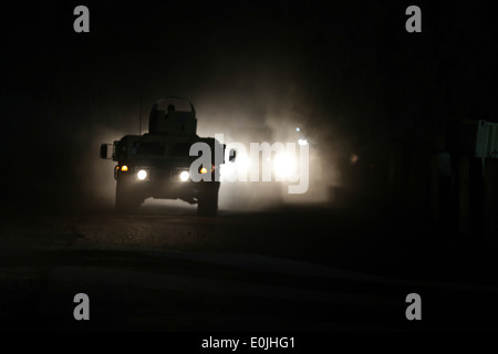 Afghan National Army Commandos mit 3. Kompanie, 1st Special Operations Kandak, fahren für eine unabhängige einseitige Mission in Stockfoto