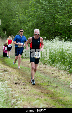 Stratford 220 Triathlon, Konkurrenten in der laufenden Phase Stockfoto