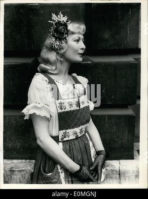 4. April 1955 - Presse-Blick auf die Royal Academy of Arts-Kunst Ausstellung. Die Meerjungfrau kommt. Foto zeigt Miss Rae Fuller eine charmante Kopf-Kleid mit ihrem französischen Bauern Kostüm trägt, als sie Ar Burlington House heute Morgen für die Presse-Ansicht von der königlichen Akademie-Ausstellung ankam. Es ist ein Porträt von ihr in der Ausstellung von Herrn W.F. Webster. Miss Fuller war das Vorbild für den berühmten Trafalgar Square Meerjungfrauen. Stockfoto