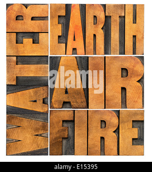 Wasser, Erde, Luft und Feuer - vier philosophische Elemente Konzept - isoliert Wort abstrakt im Buchdruck Holzart Stockfoto