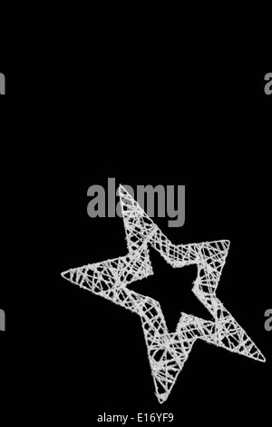 Silver Star machte aus Vires auf schwarzem Hintergrund isoliert Stockfoto