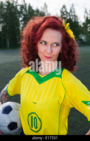 Burleske Fußball Lady Stockfoto