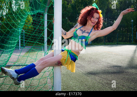 Burleske Fußball Lady Stockfoto