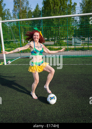 Burleske Fußball Lady Stockfoto