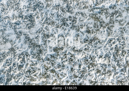 Eis-Hintergrund mit Schnee bedeckt Stockfoto