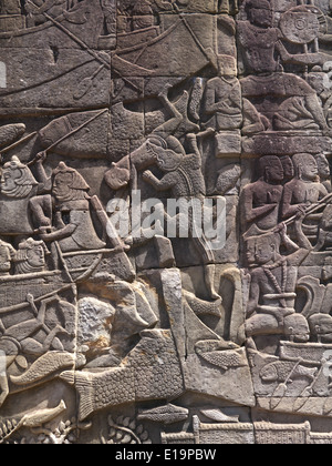 Kambodscha Angkor Thom Teil der Tempelanlage Angkor Wat.   Bas-Relief des Alltags im 12. Jahrhundert Stockfoto