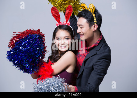 Glückliches junges Paar auf einer party Stockfoto