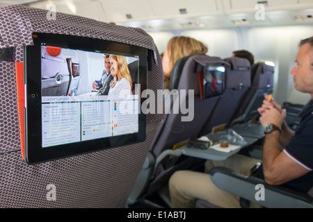 Sydney Australien, Kingsford-Smith Airport, SYD, Qantas Airlines, an Bord, Brisbane-Flug, bereitgestellt, iPad, Tablet, Passagiere Fahrer, Sitze, Pass Stockfoto