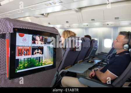 Sydney Australien, Kingsford-Smith Airport, SYD, Qantas Airlines, an Bord, Brisbane-Flug, bereitgestellt, iPad, Tablet, Beifahrerpassagiere Fahrer, Sitze, in-f Stockfoto