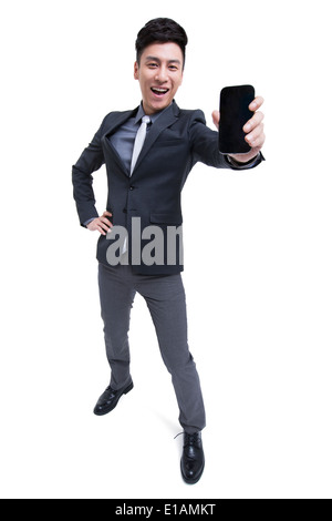 Fröhliche Geschäftsmann stolz auf seinem Smartphone Stockfoto