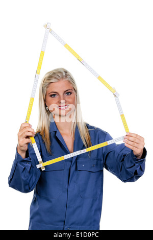 Junge, hübsche Frau mit Werkzeugen als Mechaniker Stockfoto