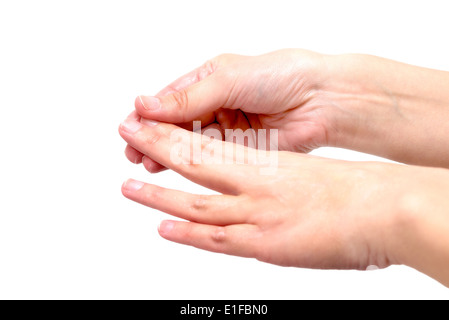 Weibliche Hände auftragen Feuchtigkeits-Lotion auf weiß Stockfoto