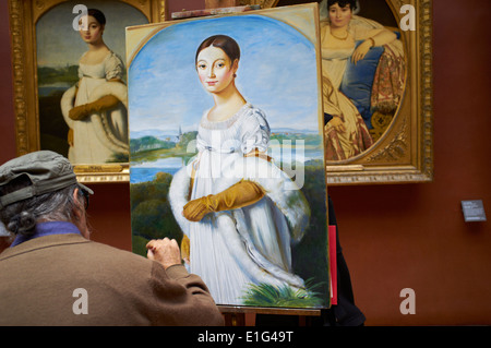 Frankreich, Paris, Louvre-Museum, M. Dagher, französische Kopist malt Mademoiselle Caroline Rivière de Jean Auguste Dominique Ingres Stockfoto