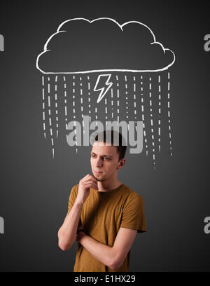 Junger Mann mit Gewitterwolke über seinem Kopf Stockfoto