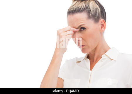 Geschäftsfrau mit Kopfschmerzen Stockfoto