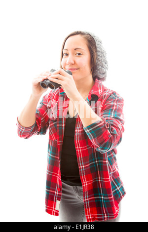 Junge Frau Holding Fernglas Stockfoto