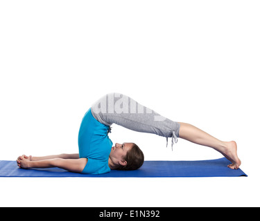 Yoga - junge schöne Frau, die Yoga Asana Übung isoliert Stockfoto