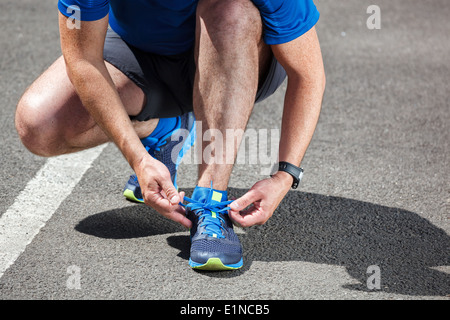 Läufer, die versuchen, immer bereit für Run Laufschuhe. Stockfoto