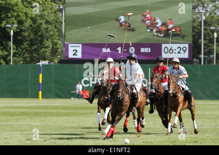 Buenos Aires V Team Peking bei Chestertons Polo im Park 2014-Team Stockfoto