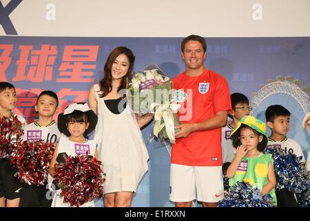 Hong Kong, China. 8. Juni 2014. Michael James Owen betreut gewerbliche Tätigkeit in Hong Kong, China auf Sonntag, 8. Juni 2014. © TopPhoto/Alamy Live-Nachrichten Stockfoto