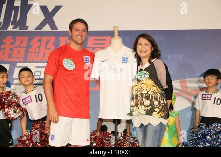 Hong Kong, China. 8. Juni 2014. Michael James Owen betreut gewerbliche Tätigkeit in Hong Kong, China auf Sonntag, 8. Juni 2014. © TopPhoto/Alamy Live-Nachrichten Stockfoto