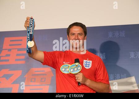 Hong Kong, China. 8. Juni 2014. Michael James Owen betreut gewerbliche Tätigkeit in Hong Kong, China auf Sonntag, 8. Juni 2014. © TopPhoto/Alamy Live-Nachrichten Stockfoto