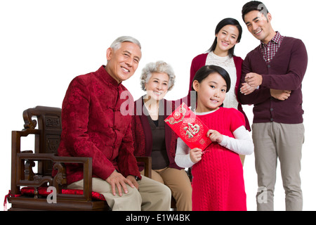 Große Familie mit roten Tasche in Chinese New Year Stockfoto