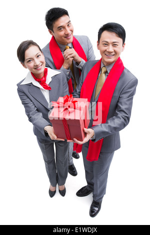 Glücklich Geschäftsleute mit Geschenk feiern Chinese New Year Stockfoto